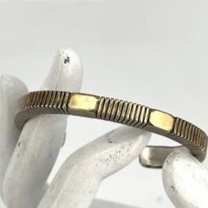 Sterling Silver with 14k gold Jonathan Nez bracelet